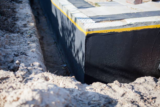 Professional Waterproofing technician working in Pasadena, MD